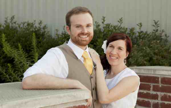 David and Lisa stand in wedding attire outside the venue of their wedding, held later that day in Skiatook, Oklahoma